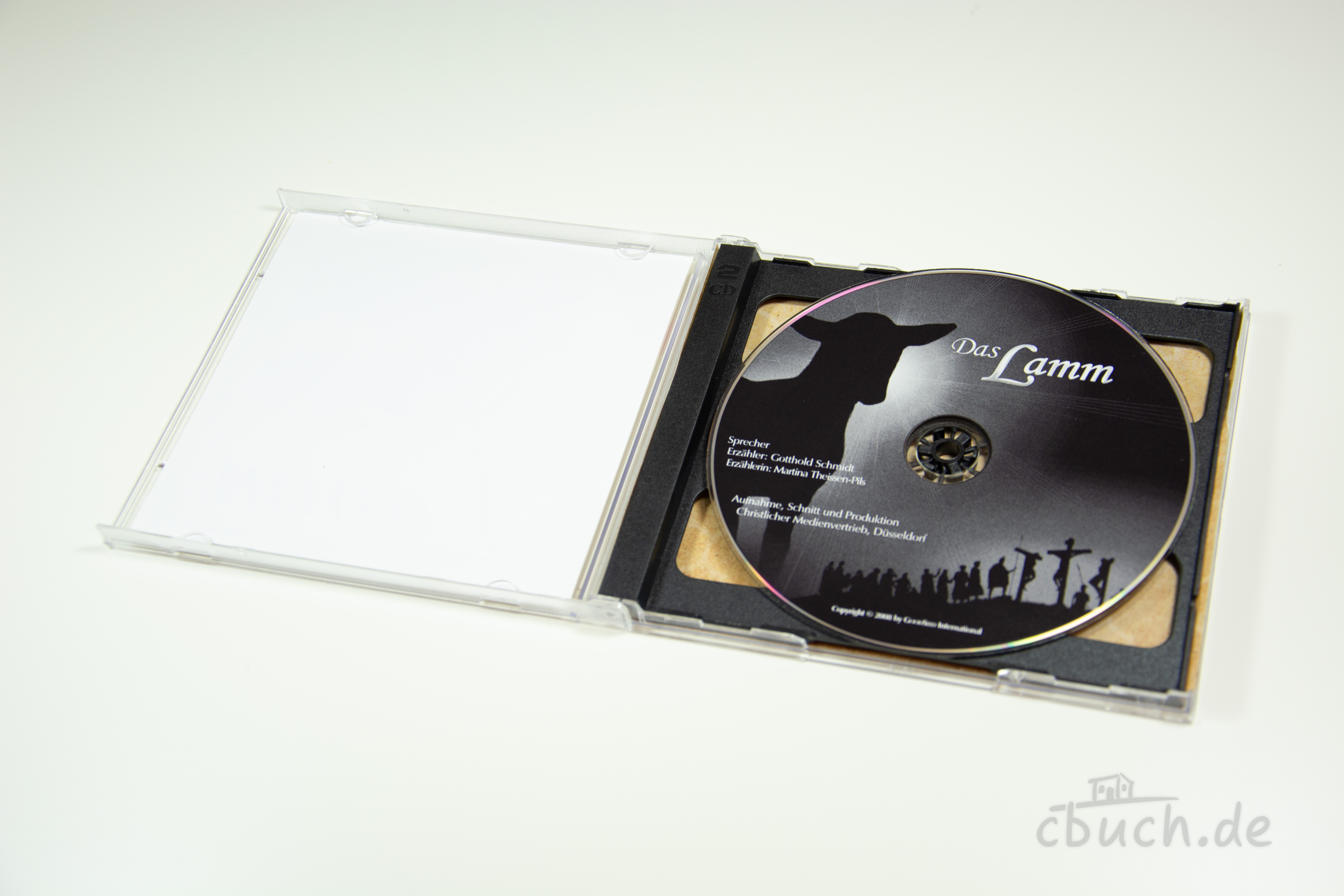 Geöffnete CD-Hülle mit der Hörbuch-CD Cross: Das Lamm von CMVH, christliches Audio-Hörspiel für Kinder ab 5 Jahren zur Heilsgeschichte von der Schöpfung bis Jesus Christus.