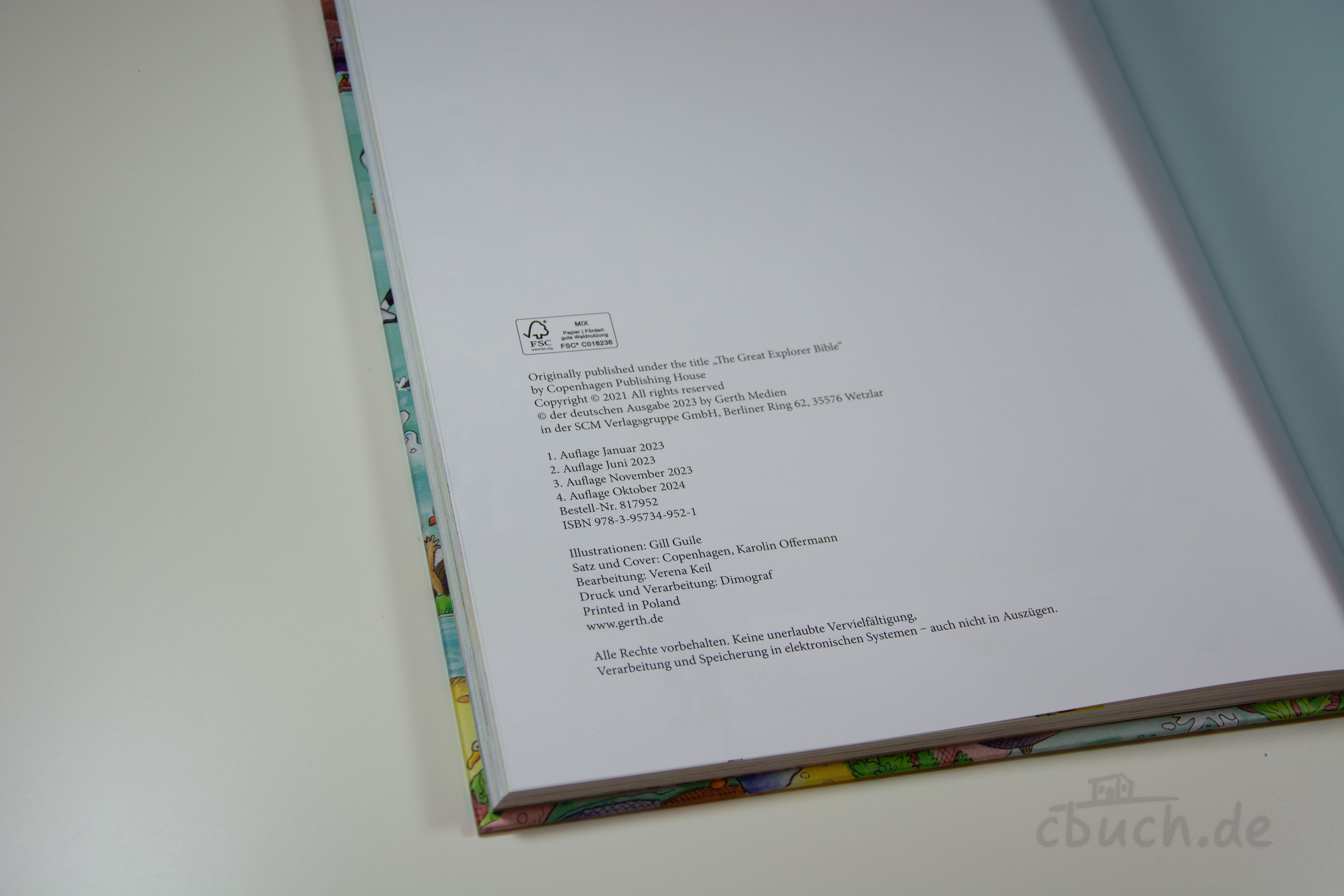 Geöffnete Impressumsseite der Kinderbibel Die große Wimmelbibel für kleine Entdecker von Gerth-Medien mit bibliografischen Angaben im Buchinneren.