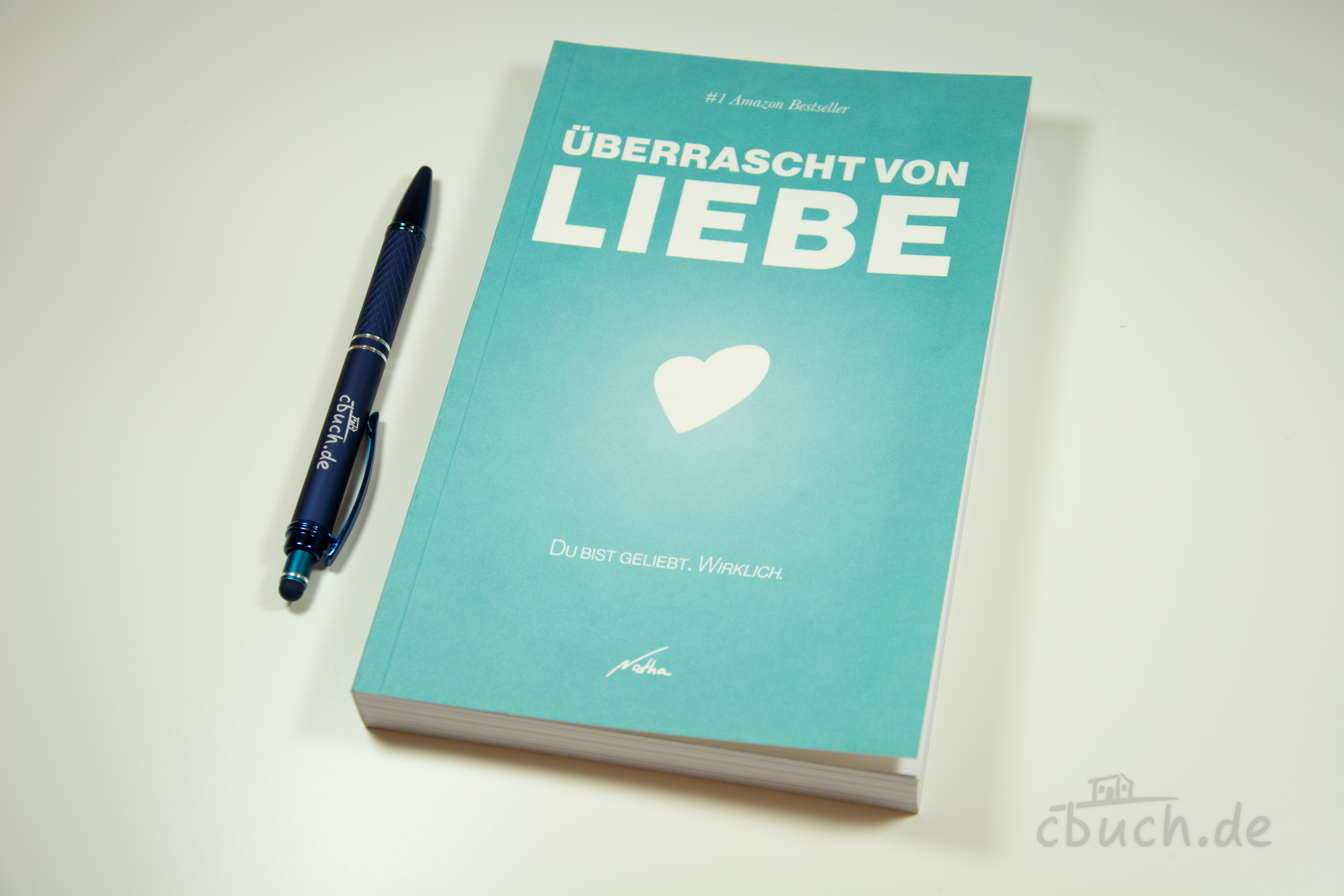 Buchcover von Nathanael Bubenzer: Überrascht von Liebe, Neuauflage bei CV – christliches Buch über Gottes Liebe mit biblischer Wahrheit, ehrlichen Geschichten und praktischen Schritten.