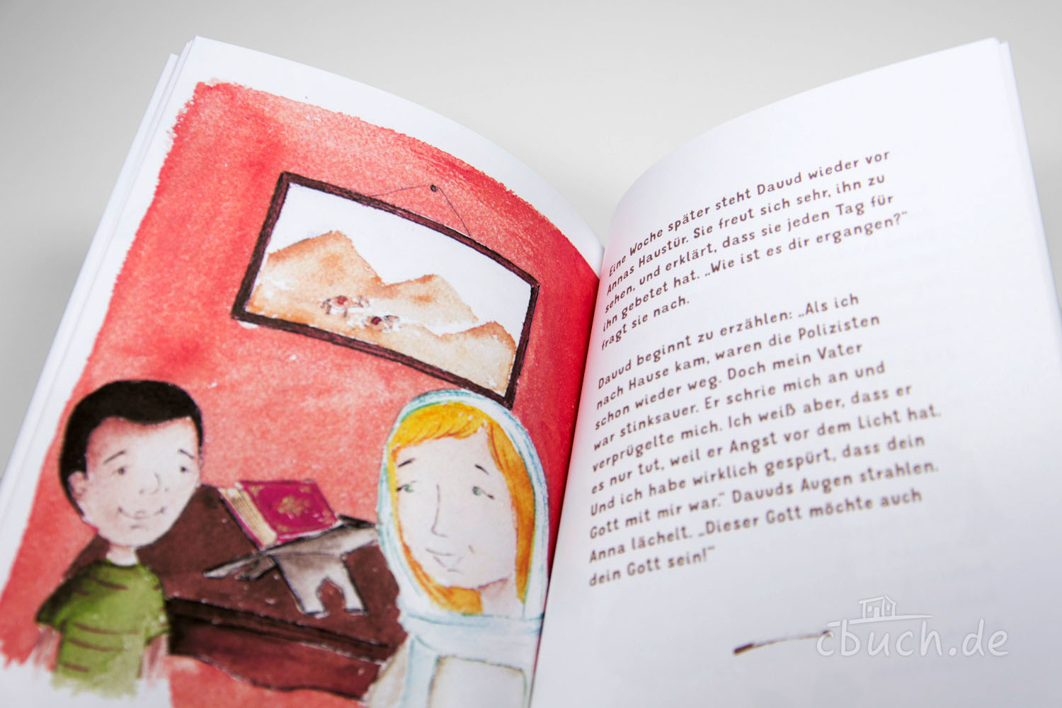Geöffnete Kinderbuchseite mit Zeichnungen und Text